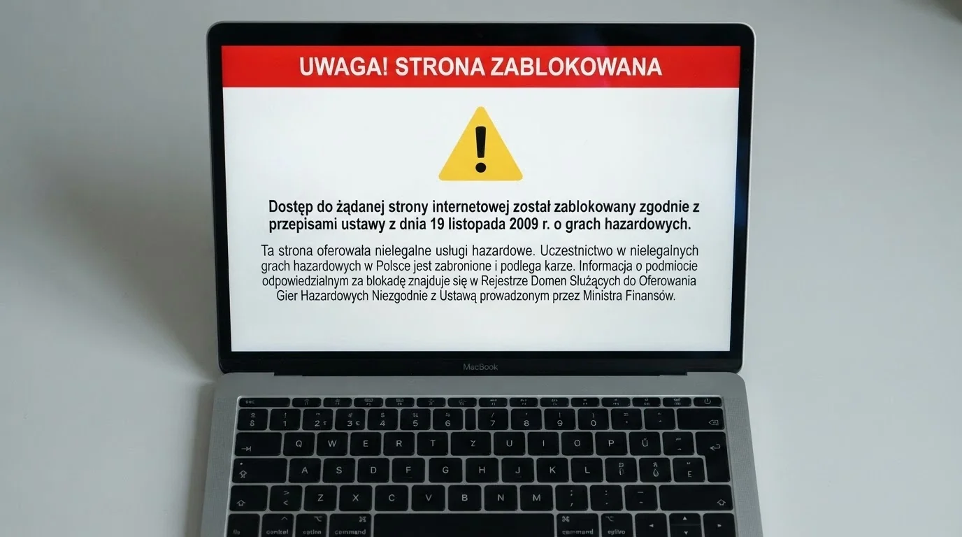 Strona ostrzeżenia Ministerstwa Finansów wyświetlana po zablokowaniu nielegalnej domeny hazardowej — biało-czerwony interfejs z tekstem ostrzeżenia